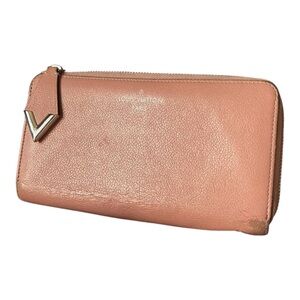 Louis Vuitton Comète wallet in Pink Taurillon leather